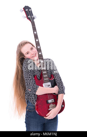 Teen blonde girl et guitare basse contre fond blanc en studio Banque D'Images