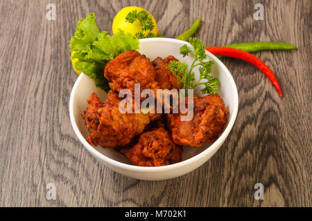 Une cuisine traditionnelle indienne - sucettes de poulet aux épices Banque D'Images