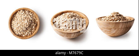 L'avoine en matières premières bol en bois isolé sur fond blanc. Trois types de vue Banque D'Images