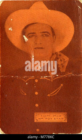 Une image de Tom Mix, un acteur américain célèbre du début du XXe siècle, connu pour ses rôles dans les films occidentaux. La photographie le montre comme une star de la William Fox film Corporation. Banque D'Images