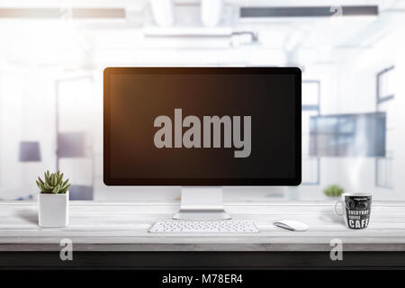 Vide l'écran de l'ordinateur de bureau sur maquette pour. Tasse à café et de l'usine à côté. Banque D'Images