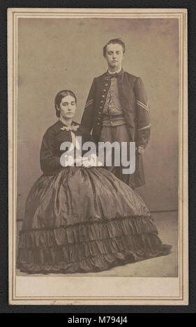 Une photographie de F.A. Freeman montrant un soldat de l'Union non identifié en uniforme debout avec une femme, probablement sa femme, prise à Boston au no 145 Hanover Street. L'image capture un moment historique de l'époque de la guerre civile. Banque D'Images