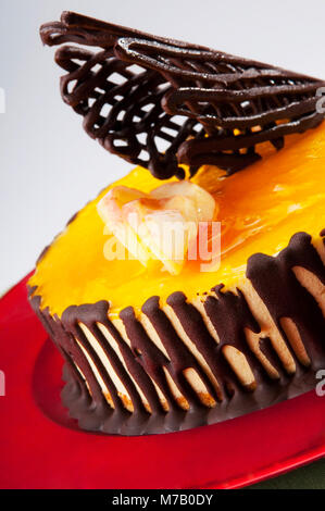 Close-up de garniture au chocolat Gâteau flan citron sur Banque D'Images