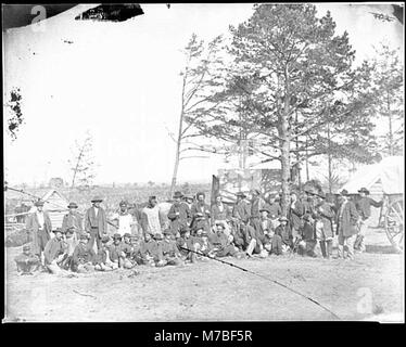 Cette image représente des éclaireurs et des guides de l'armée du Potomac pendant la guerre de Sécession à Brandy Station, en Virginie. Les éclaireurs ont joué un rôle clé dans la collecte de renseignements et le commandement des troupes au combat. Banque D'Images