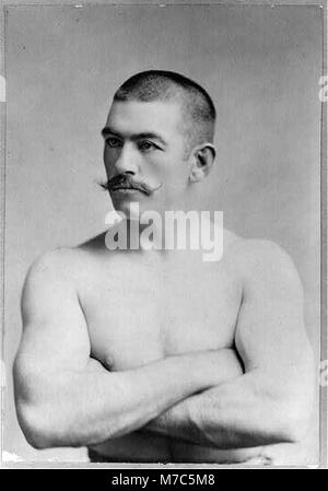 Un portrait historique de John Lawrence Sullivan, un célèbre boxeur américain, capturant son image comme une figure clé dans les débuts de la boxe professionnelle. Banque D'Images
