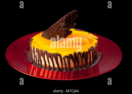 Close-up de garniture au chocolat Gâteau flan citron sur Banque D'Images