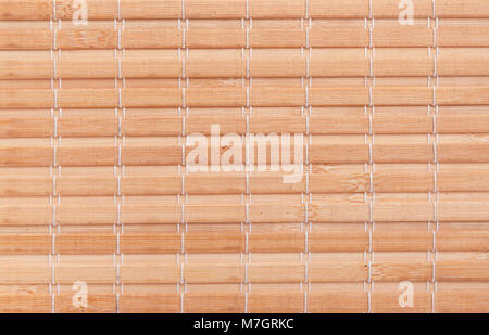 Nappe de bambou sur la table. Un motif est visible. Banque D'Images
