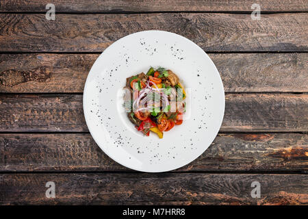 Avec salade de chou-fleur et d'aubergines en sauce épicée Banque D'Images