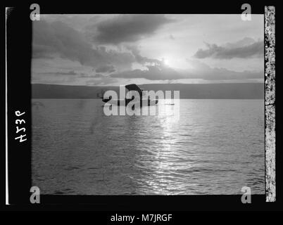 L'air vues de Palestine. Avions etc. de l'Imperial Airways Ltd., sur la mer de Galilée et à Semakh. "Bateau volant. atyrus' silhouette Sunrise matpc LOC.15808 Banque D'Images