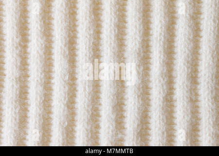 La texture d'un tricot de laine blanche, avec un motif côtelé à rayures  Photo Stock - Alamy
