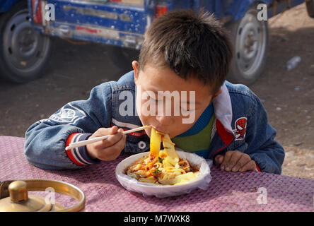 Au grand marché du dimanche de Kashgar, Xinjiang, Chine Banque D'Images