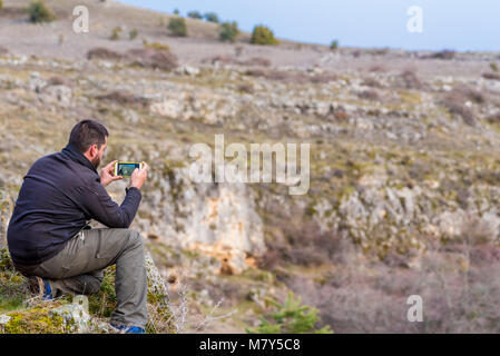 Fotografiando Autorretrato con el movil Banque D'Images