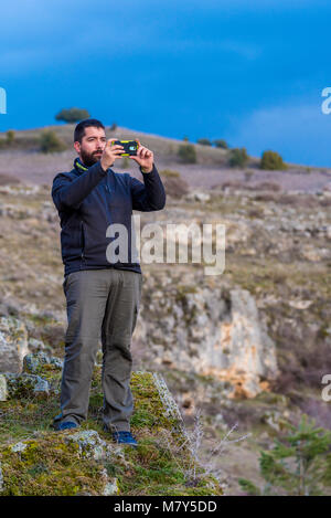 Fotografiando Autorretrato con el movil Banque D'Images