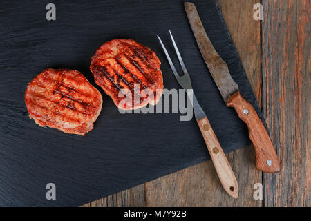 Le restaurant-grill gastronomique Menu - Steak de Bœuf à New York sur fond de bois. Premier Pavé de boeuf Black Angus. Steak de boeuf Banque D'Images