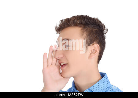 Portrait teen boy hurlant de bouche grande ouverte. Isolé sur fond blanc. Banque D'Images