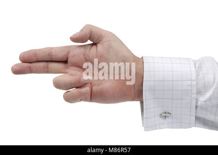 Male executive holding sa main ou ses doigts pointant sous la forme d'un fusil isolé sur un fond blanc. Banque D'Images