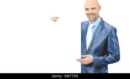 Entrepreneur à la holding a white poster et montrant sur le texte de la publicité pour votre main Banque D'Images