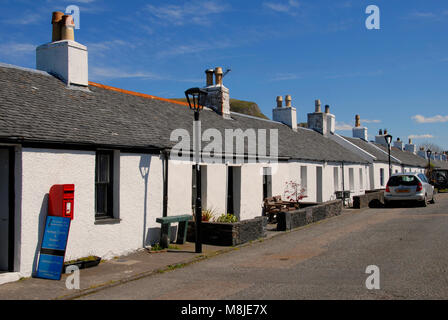 Rangée d'anciens mineurs d'ardoise, cottages, Ellenabeich Seil Island, Ecosse Banque D'Images