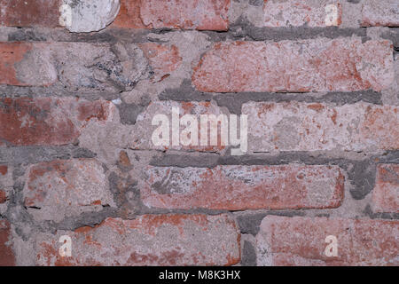 Fragment d'un vieux mur de brique rouge texture background Banque D'Images