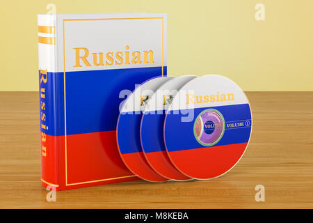 Livre russe avec le drapeau de la Russie et des CD sur la table en bois. Le rendu 3D Banque D'Images