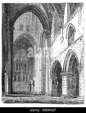 La nef du 12ème et 13ème siècle, l'église de St Croix à Winchester, Hampshire, Angleterre est plus comme une cathédrale miniature qu'une chapelle d'indigents. Le bâtiment est en style gothique/Norman transitoire. Le fondateur en 1135 était Henry de Blois, évêque de Winchester, petit-fils de Guillaume le Conquérant et jeune frère de Stephen King de l'Angleterre. Banque D'Images