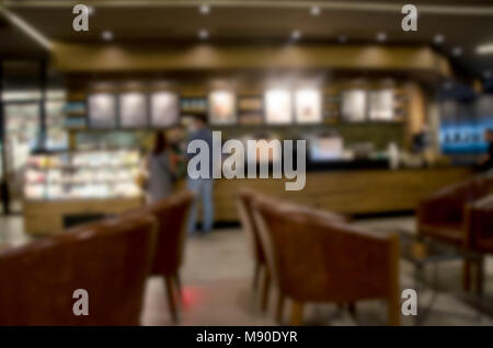 L'intérieur d'un flou vintage coffee shop. Utiliser une image de fond du produit. Banque D'Images