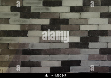Les murs de brique en noir et blanc à rayures Banque D'Images