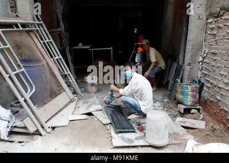 Les travailleurs sur site de construction. Ho Chi Minh Ville. Le Vietnam. Banque D'Images