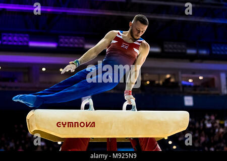 Birmingham, UK. 21 mars, 2018. Dominick Gunnigham (GBR) est en concurrence sur le cheval d'arçons lors de la Coupe du Monde de Gymnastique FIG 2018 Arena à Birmingham le mercredi, 21 mars 2018. Birmingham England. Credit : Taka Wu/Alamy Live News Banque D'Images