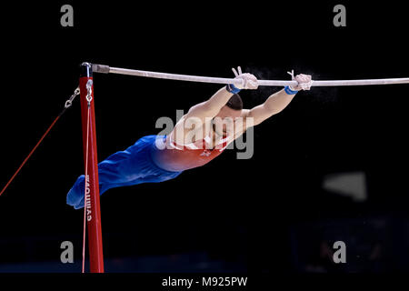 Birmingham, UK. 21 mars, 2018. Dominick Gunnigham (GBR) est en concurrence sur la barre horizontale pendant la Coupe du Monde de Gymnastique FIG 2018 Arena à Birmingham le mercredi, 21 mars 2018. Birmingham England. Credit : Taka Wu/Alamy Live News Banque D'Images