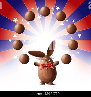 Lapin de Pâques en chocolat jongleur avec des oeufs et red ribbon bow isolé sur stars Banque D'Images