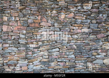 Mosaïque murale en pierre naturelle - construction pierre roche wall background Banque D'Images