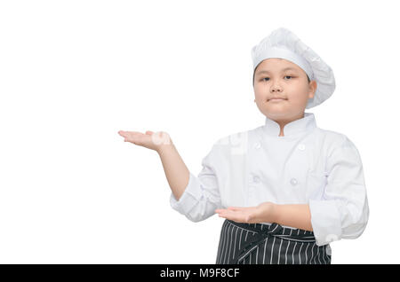 Fat boy chef showing et présentation. chef de l'enfant isolé sur fond blanc. Banque D'Images