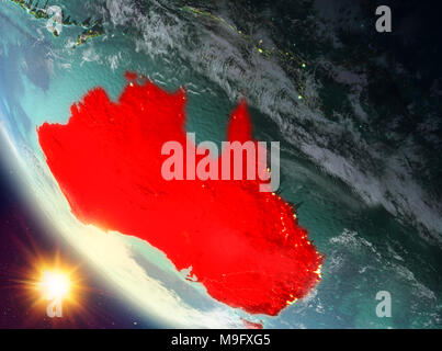 L'Australie pendant le coucher du soleil en rouge sur la planète Terre avec des nuages. 3D illustration. Éléments de cette image fournie par la NASA. Banque D'Images