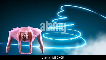Ballerine avec glowing Neon lignes pivotant Banque D'Images