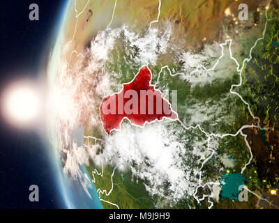 Vue Satellite de l'Afrique centrale en rouge sur la planète Terre avec des nuages et des frontières du pays visible au coucher du soleil. 3D illustration. Éléments o Banque D'Images