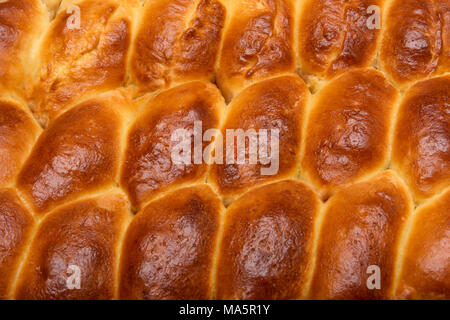 Gâteaux russes close-up. Cuisson au four fait maison. Le concept de les épis de blé et les produits à base de céréales. Banque D'Images