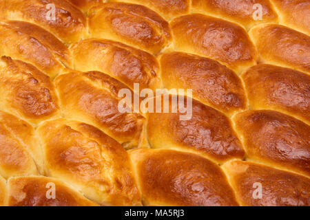 Gâteaux russes close-up. Cuisson au four fait maison. Le concept de les épis de blé et les produits à base de céréales. Banque D'Images