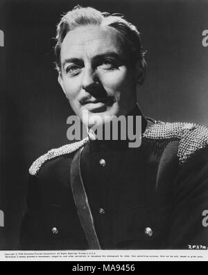 Michael Wilding, Portrait publicitaire, sur-ensemble de la British Film, 'Zarak', Columbia Pictures, 1956, date de sortie du film, le 10 janvier, 1957 Banque D'Images