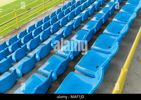 Sièges bleu sur Stadium Banque D'Images