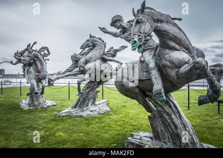 Le groupe "Polo Match" sculpture par Huang Jian, un célèbre artiste chinois, Banque D'Images