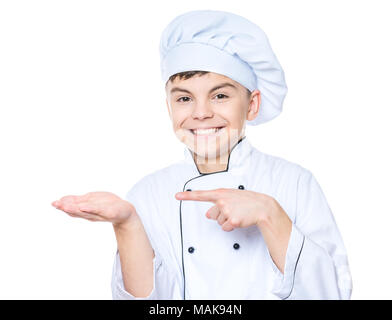 Teen boy wearing uniformes chef Banque D'Images