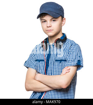 Teen boy avec cap et écouteurs Banque D'Images