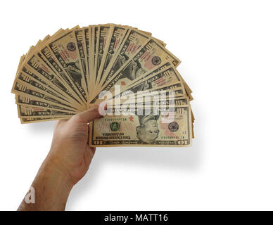 Man's hand holding, un groupe de 10 dollar bills en éventail sur fond blanc. Enregistrer une sélection inclus Banque D'Images