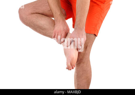 Concept de soins de santé. L'homme souffrant de douleur aux pieds Banque D'Images