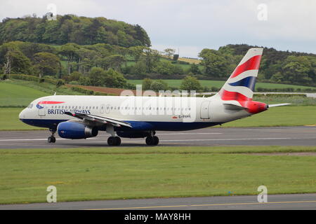 G-EUYB, un Airbus A320-232 exploité par British Airways, à l'aéroport de Prestwick en Ayrshire. Banque D'Images