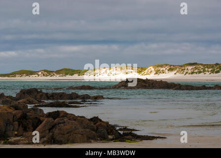 La lumière du soleil partie éclairante d'une dune de sable sur l'île de Tiree des Hébrides intérieures, Argyll and Bute, Ecosse. 22 juin 2007. Banque D'Images