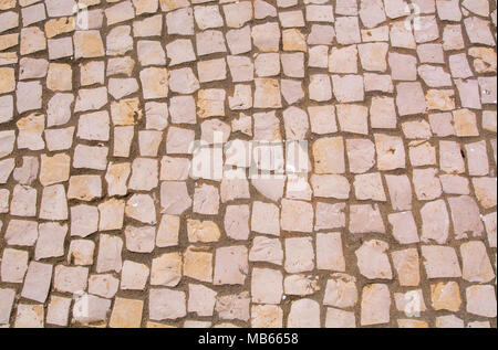Trottoirs en pierre traditionnelle portugaise texture pattern Banque D'Images