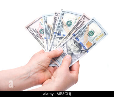La main de l'homme comptant us dollar bills permanente pour toutes les dettes publiques et privées, Banque D'Images