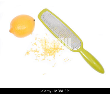 Grille en acier inoxydable zester et le zeste de citron, zeste isolé sur fond blanc Banque D'Images